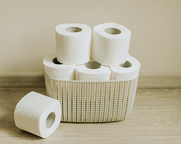Photo of a basket of toilet paper